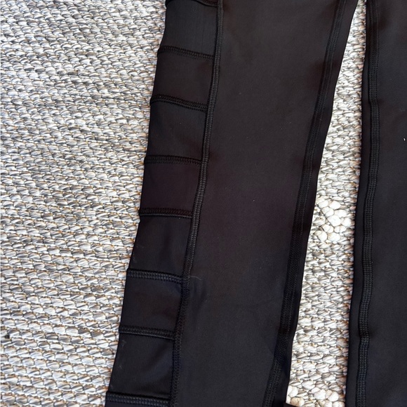 Gottex black leggings phone pocket mesh holes on sides size XS - Picture 2 of 7